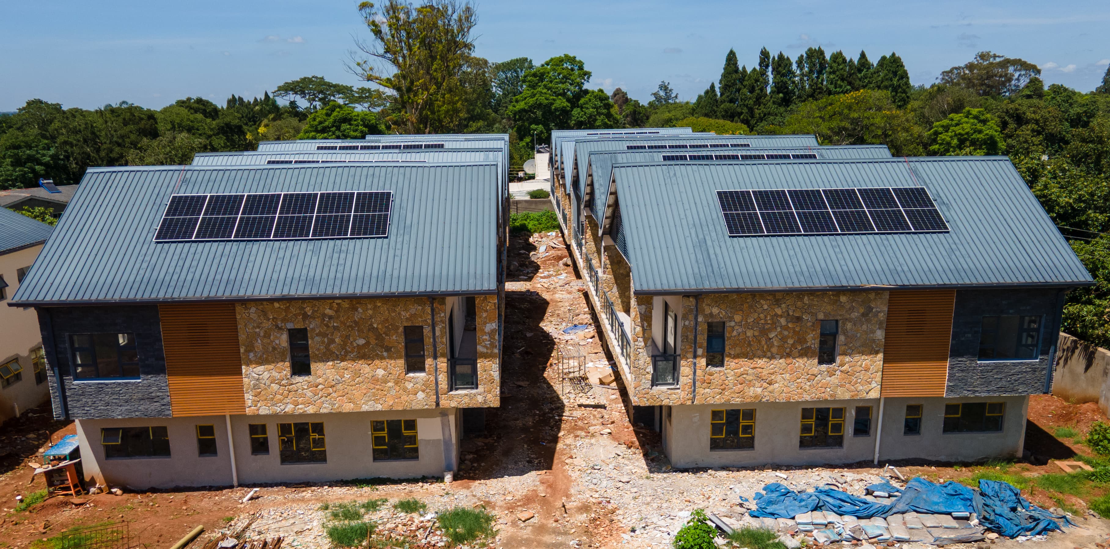 Bird's-eye view of the Prevail Properties campus showcasing modern architectural design integrated with lush greenery.